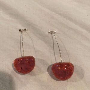 NWOT cherry earrings in gold and reddish pink.